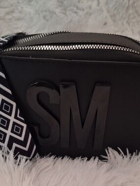Steve Madden Black Crossbody with Monogram Accent and Patterned Strap